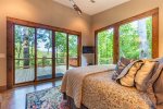 Master Suite Features a King Bed, Flat Screen TV and Double Sliding Glass Doors